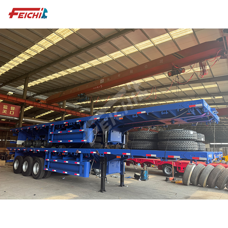 Tri-Axle Flatbed Semi-Trailer with Container Twist Lock 40 Ton 20ft 40ft Container Cargo Flatbed Tru